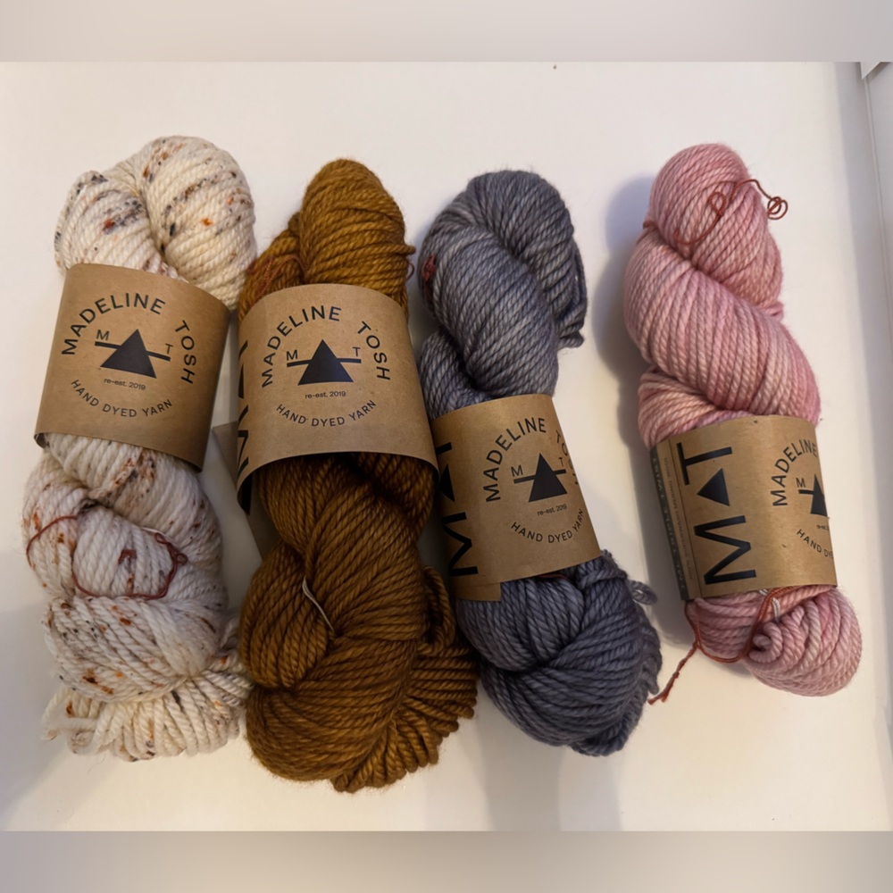 4 skeins Mad Tosh triple twist.  130 yards each.